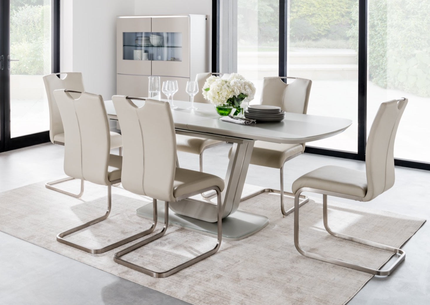 Extending grey dining table and deals chairs