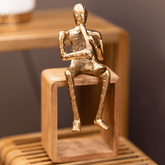 Sitting musician trumpet gold